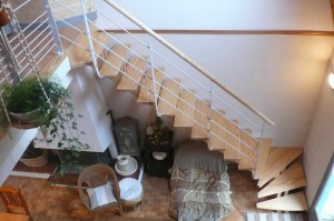 Double limon central et rampes métal laqué