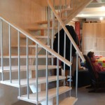 Limon central en frêne olivier, barreaux Inox